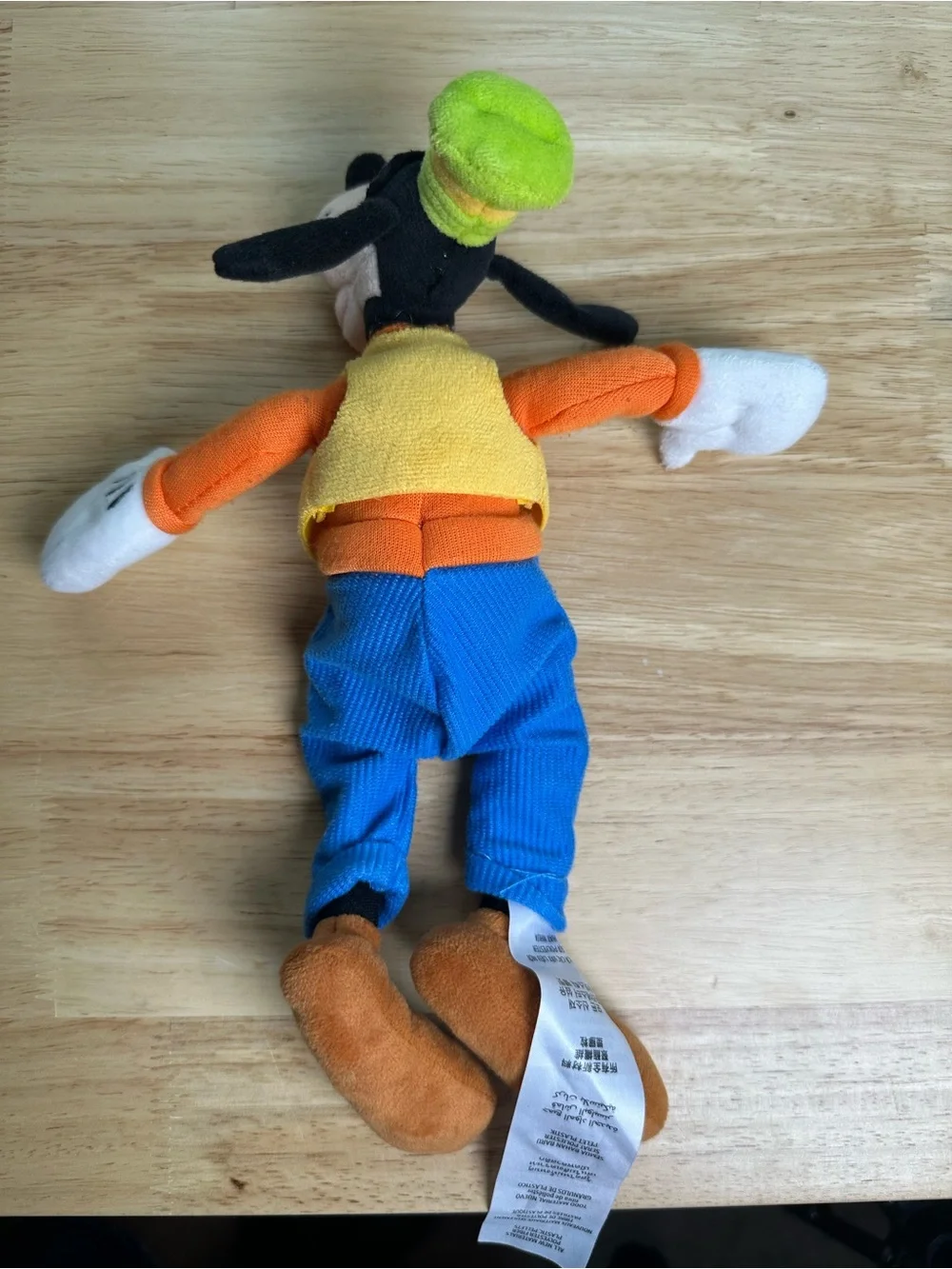 Disney parks collectible Goofy Plush in Orange, Blue & Green Outfit